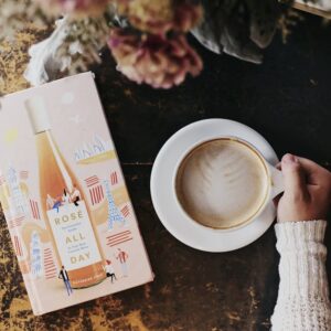 A cozy morning setting with a latte and a book, perfect for relaxation and enjoyment.